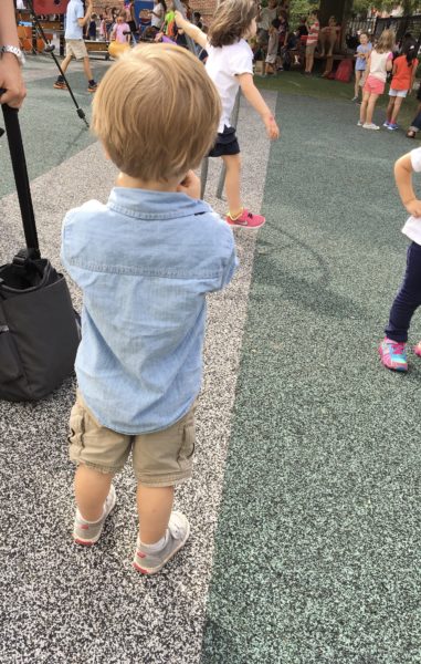 The family's view. A little boy on a big playground.